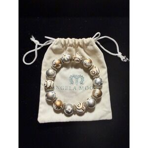 Angela Moore Beaded Stretch Bracelet White Gold Tone Floral Swirl Design